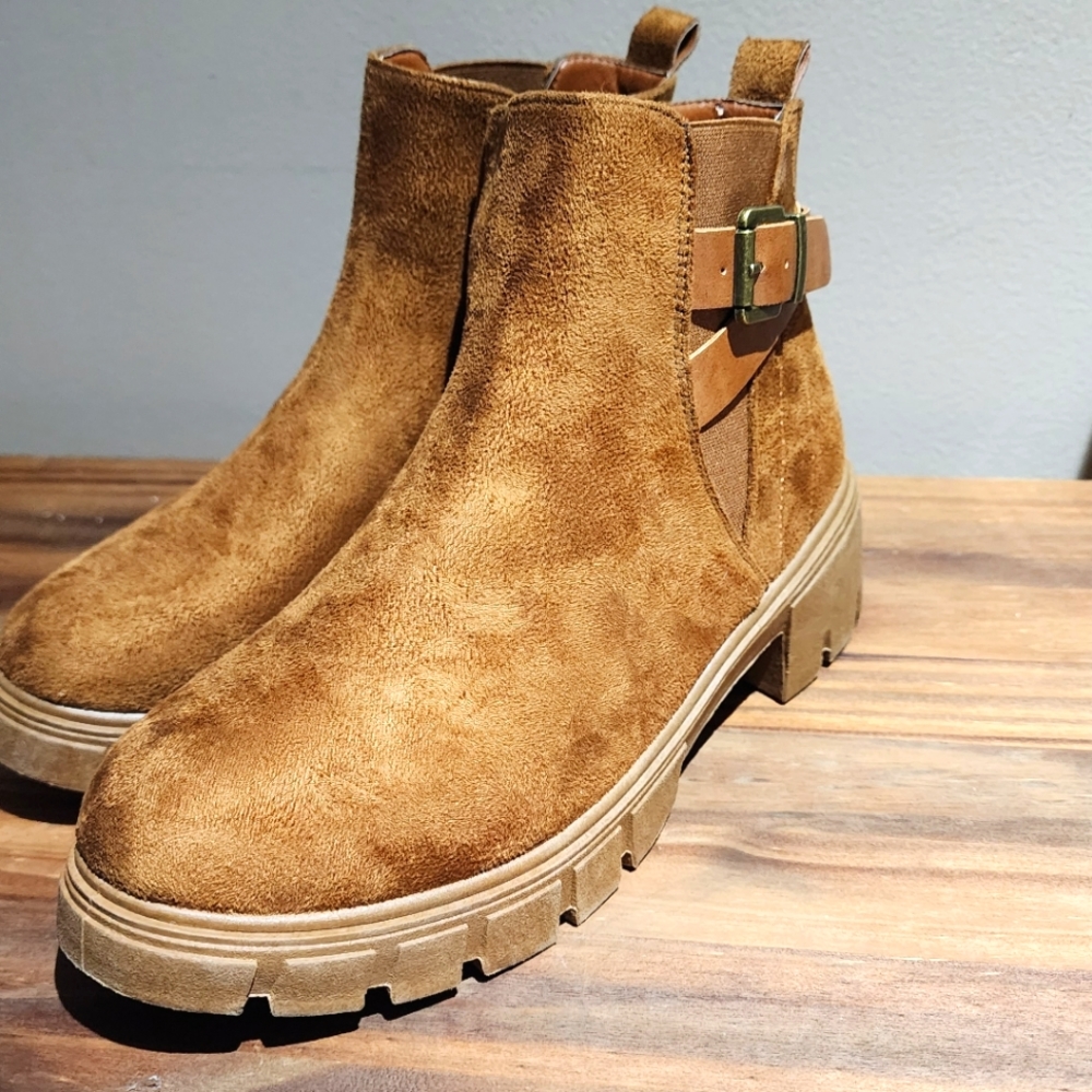 Brand new still have sale sticker boots.
